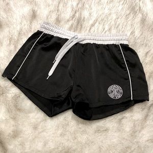 Black heavy, satin-like shorts. Excellent condition.